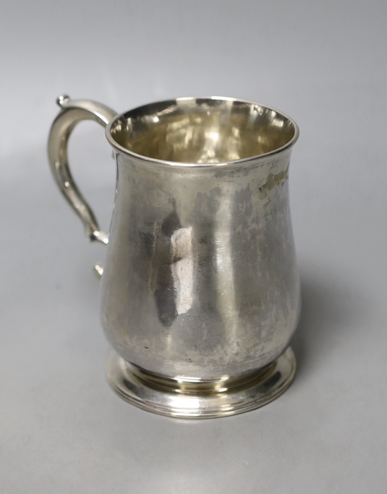 A George II silver mug, by Richard Gurney & Thomas Cook, London, 1752, 95mm, 199 grams, (a.f.).